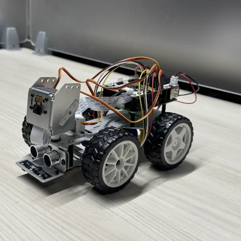 The rover from its left front quarter: nose to the left, the left-hand wheels toward the camera.