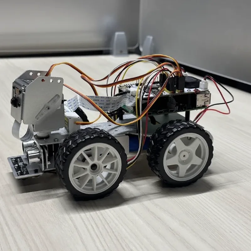 The rover's left side, seen a little from ahead: both left wheels, the boards stacked above the rear one.