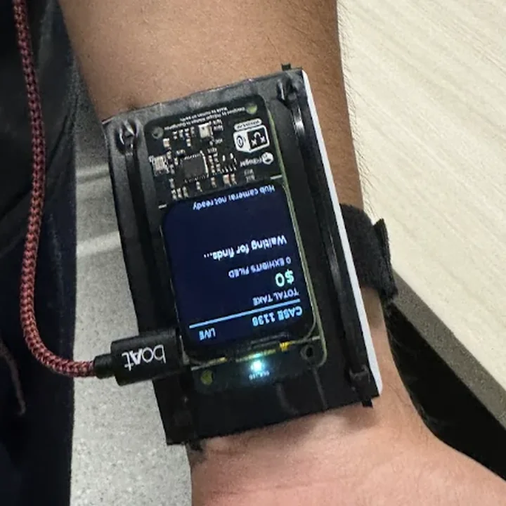 From over the hand, looking back up the arm: the unit square to the camera, the palm below it.